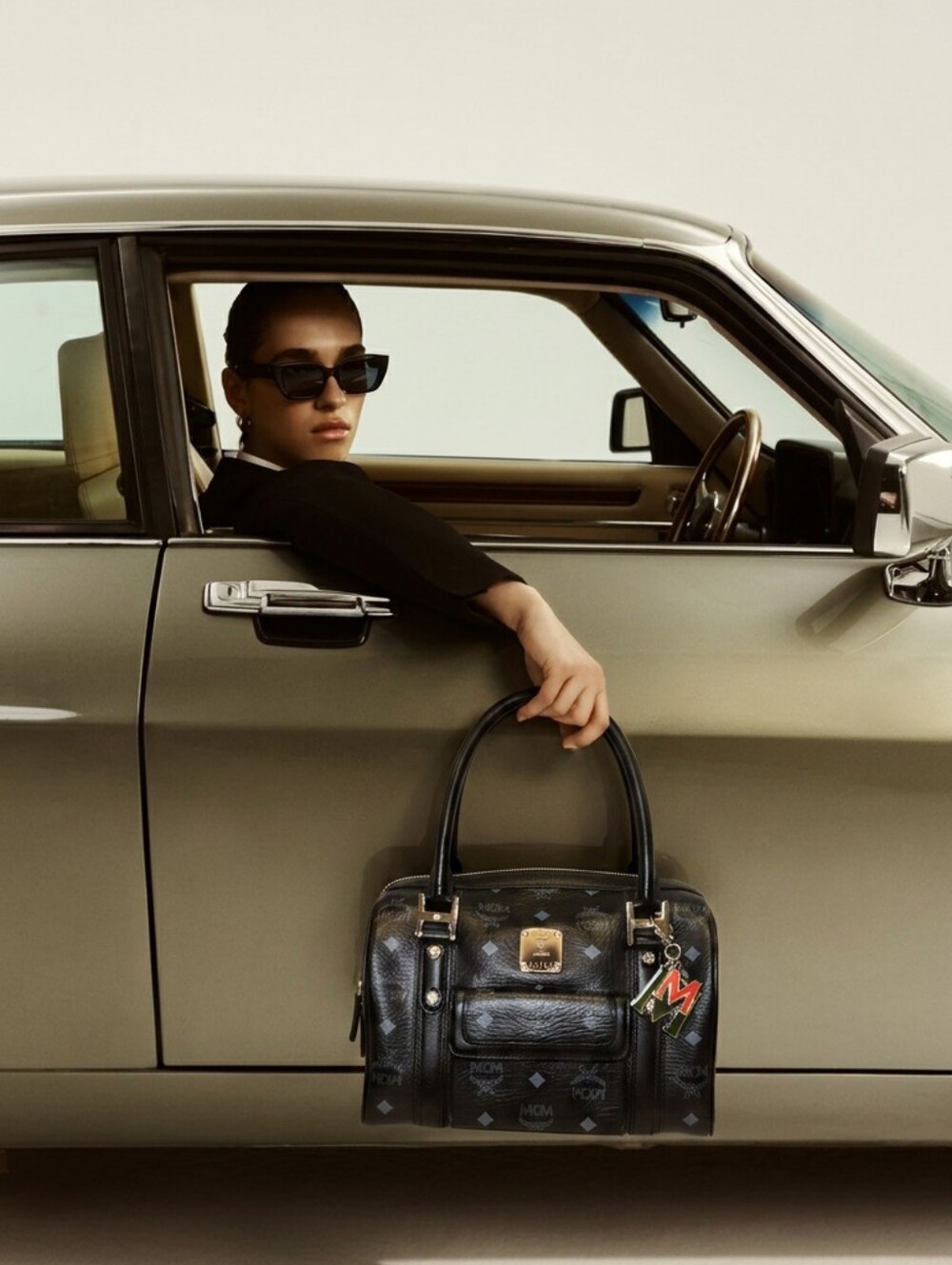 MCM Black Visetos Boston Satchel with Gold Logo Plate